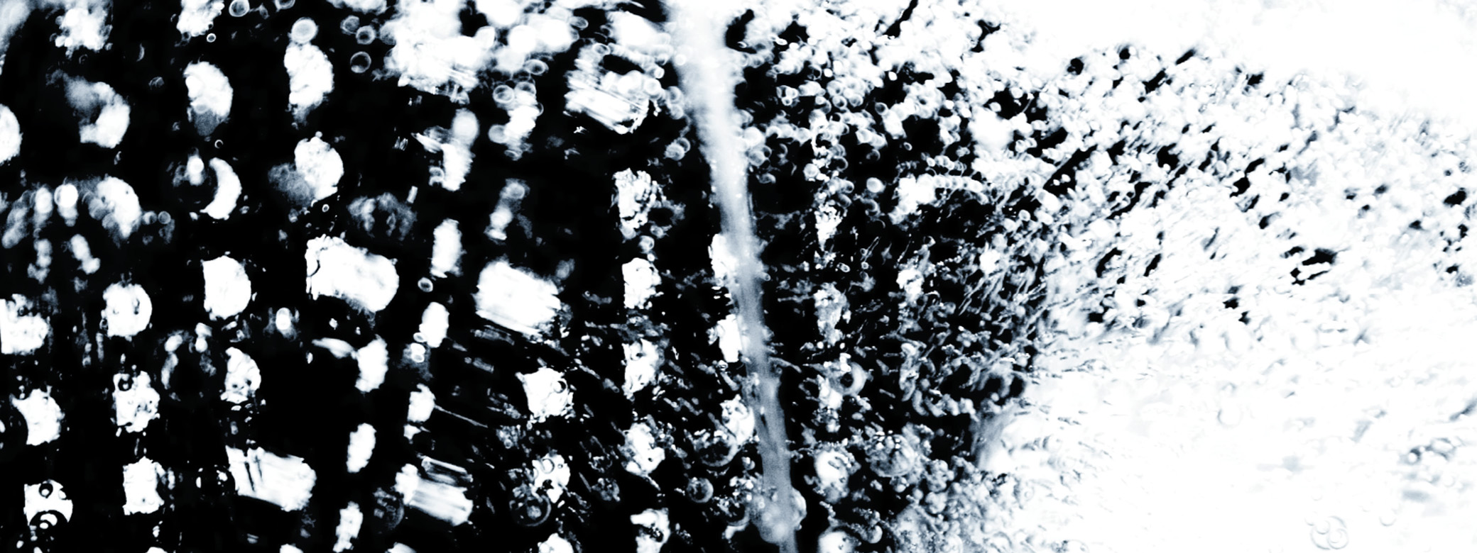 photo of a metal grate in ice