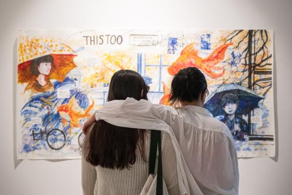 Gallery visitors looking at work in the 2026 BA in Art Graduation Exhibition Group 1