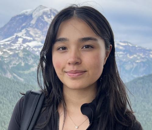 Aaliyah portrait with mountains on the background