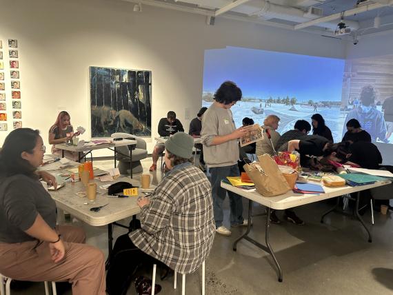 Students participating in the zine workshop in the Jacob Lawrence Gallery