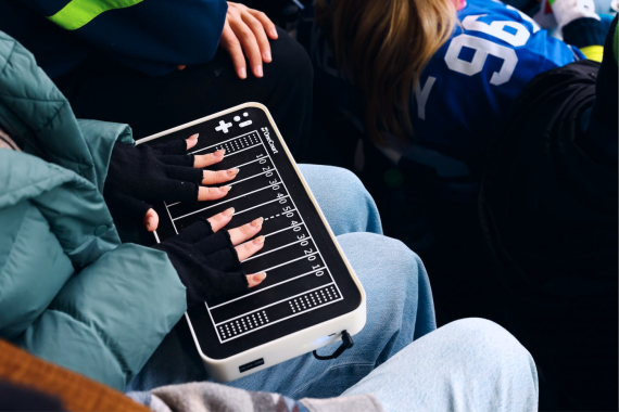 Close-up of user with OneCourt device