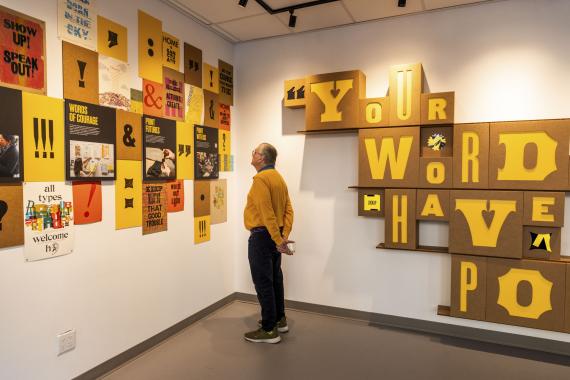 A person viewing Your Words Have Power at Partners in Print
