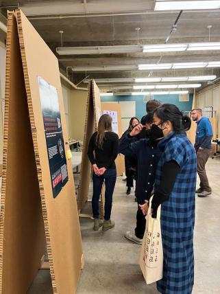 People viewing MDes research posters