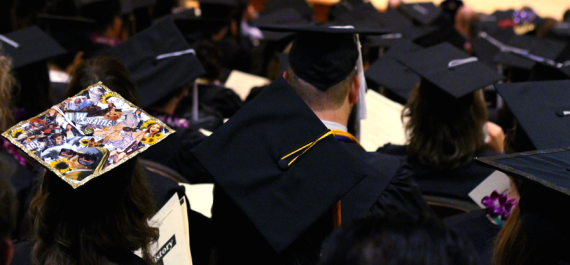 Graduating students with decorated caps