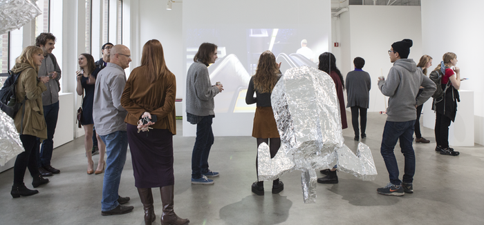 Students in exhibition gallery