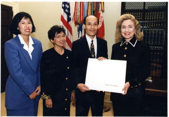 Ron Chew and others receiving IMS award from Hilary Clinton