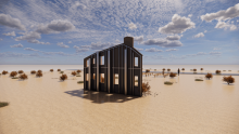 Rear view of Whitney Lynn's Atomic Open House: image features the back facade of a prop house surrounded by desert terrain, with a backdrop of a clear sky.