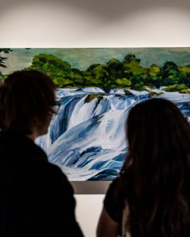 Two visitors at the Jacob Lawrence Gallery