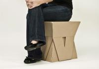 Student sitting on constructed stool 