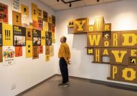 A person viewing Your Words Have Power at Partners in Print