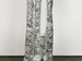 Michael Hong. 큰 손 (Big-Hand), 2024. Stoneware, aluminum silver leaf, and rice bags. 72 x 24 x 24 inches