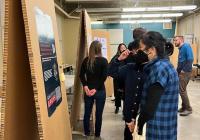 People viewing MDes research posters