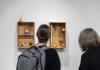 Visitors viewing Rob Rhee's exhibition, Crossings