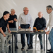 Icons of innovation, these industrial designers who trained at the UW enjoy a reunion in an Art Building workroom. From left: Steve Kaneko, Dell King, David Smith, George McCain and Harold Kawaguchi. KRIS LADERA