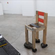 Close-up of student's work that features a chair.
