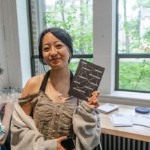 Alum with a postcard