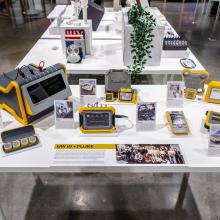 Exhibition view of a display table featuring a student's work.