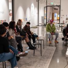Attendees of the Liberation Book Club having a discussion