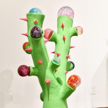 Close-up of student's free-standing glass and ceramic work