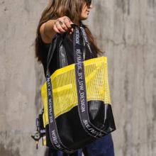 Model showcasing one of the bags from the project