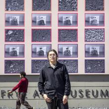 Stefen Gonzales with art installation in the background