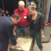 Creating mold for glass hands at Glass Facilities Celebration