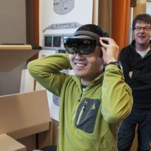 Scott Tsukamaki wearing Microsoft HoloLens