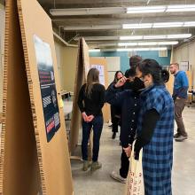 People viewing MDes research posters