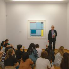 Associate Professor Marek Wieczorek and students in a museum