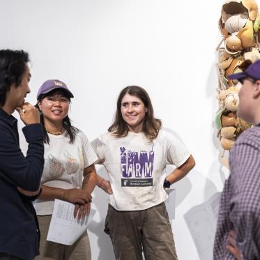Rob Rhee talking with UW Farm staff