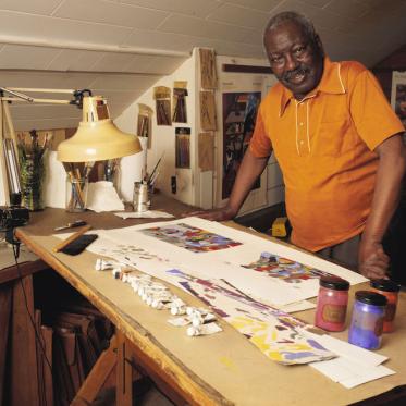 Jacob Lawrence in his home studio