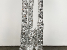 Michael Hong. 큰 손 (Big-Hand), 2024. Stoneware, aluminum silver leaf, and rice bags. 72 x 24 x 24 inches