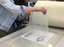 Student doing paper litho