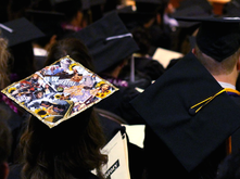 Graduating students with decorated caps